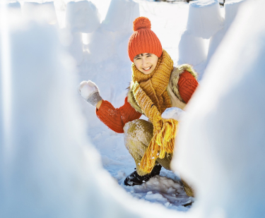 Child Playing With Snow